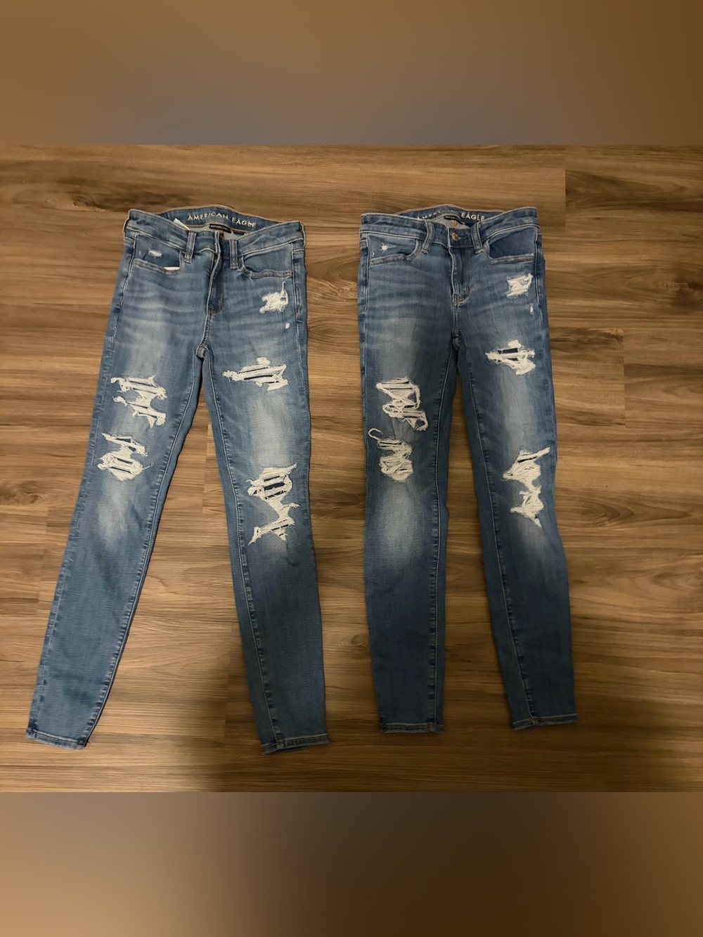 Two pair of American Eagle Outfitters Women's size 0, Blue Ripped Skinny Jeans